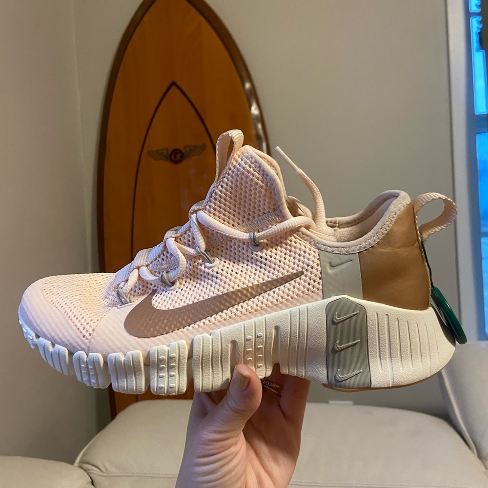 Rose gold Nike shoes